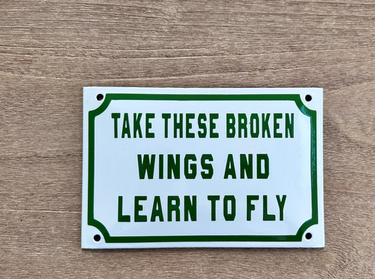 Broken Wings Street Sign